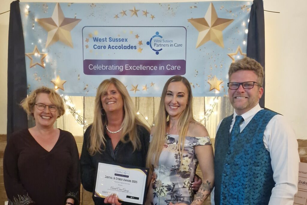 Assist Care Group receiving award from Digital Care Hub